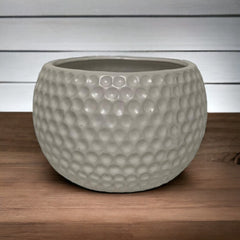 Maceta de cerámica con diseño tipo pelota de golf 14x11x11